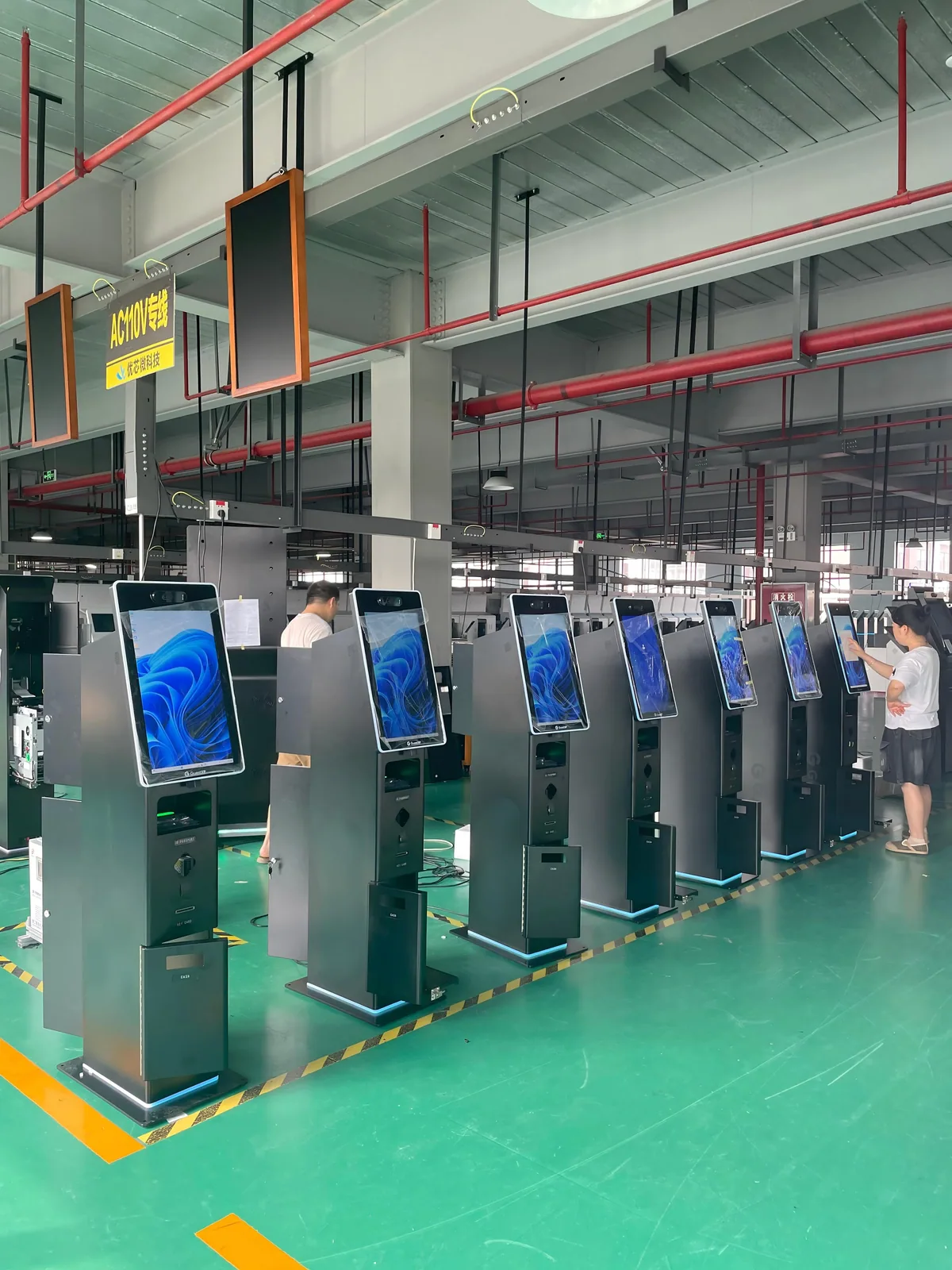 Hotel self-check-in kiosks with cash payment modules during production