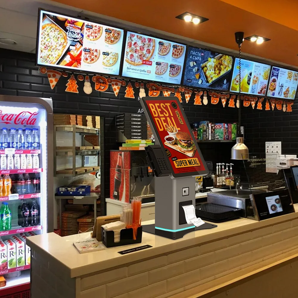 Floor-standing self-service kiosk deployed in a public service environment